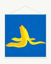 Blue Banana art print with included white cylindrical hanging rods