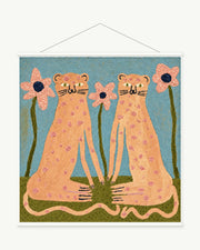 Blush Leopards art print with included white cylindrical hanging rods