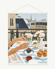 Breakfast Over the City art print with included white cylindrical hanging rods
