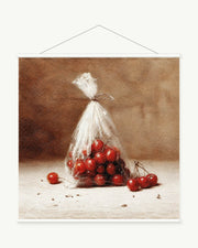 Cherries in a Clear Bag art print with included white cylindrical hanging rods