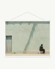 Pacific Solitude art print with included white cylindrical hanging rods