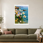 Irises Above a Turquoise Cove, shown as a complete bordered art print with white hanging rods above a sofa in a living room.
