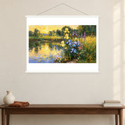 Yellow Irises at Sundown, shown as a complete bordered art print with white hanging rods above a console in a closer room view.