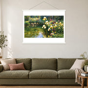 White Irises on the Shaded Bank, shown as a complete bordered art print with white hanging rods above a sofa in a living room.