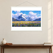 Wildflower Plain Below Snow Peaks, shown as a complete bordered art print with white hanging rods above a console in a closer room view.