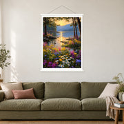 Sunset Between Lakeside Pines, shown as a complete bordered art print with white hanging rods above a sofa in a living room.