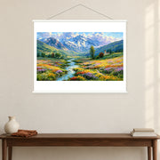 Meadow Stream and Mountain Chapel, shown as a complete bordered art print with white hanging rods above a console in a closer room view.