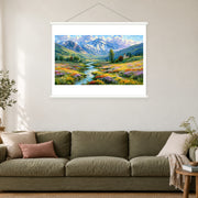 Meadow Stream and Mountain Chapel, shown as a complete bordered art print with white hanging rods above a sofa in a living room.