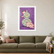 Patterned Gourd with Peaches, shown as a complete bordered art print with white hanging rods above a sofa in a living room.