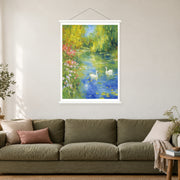 Two White Birds on Green Water, shown as a complete bordered art print with white hanging rods above a sofa in a living room.